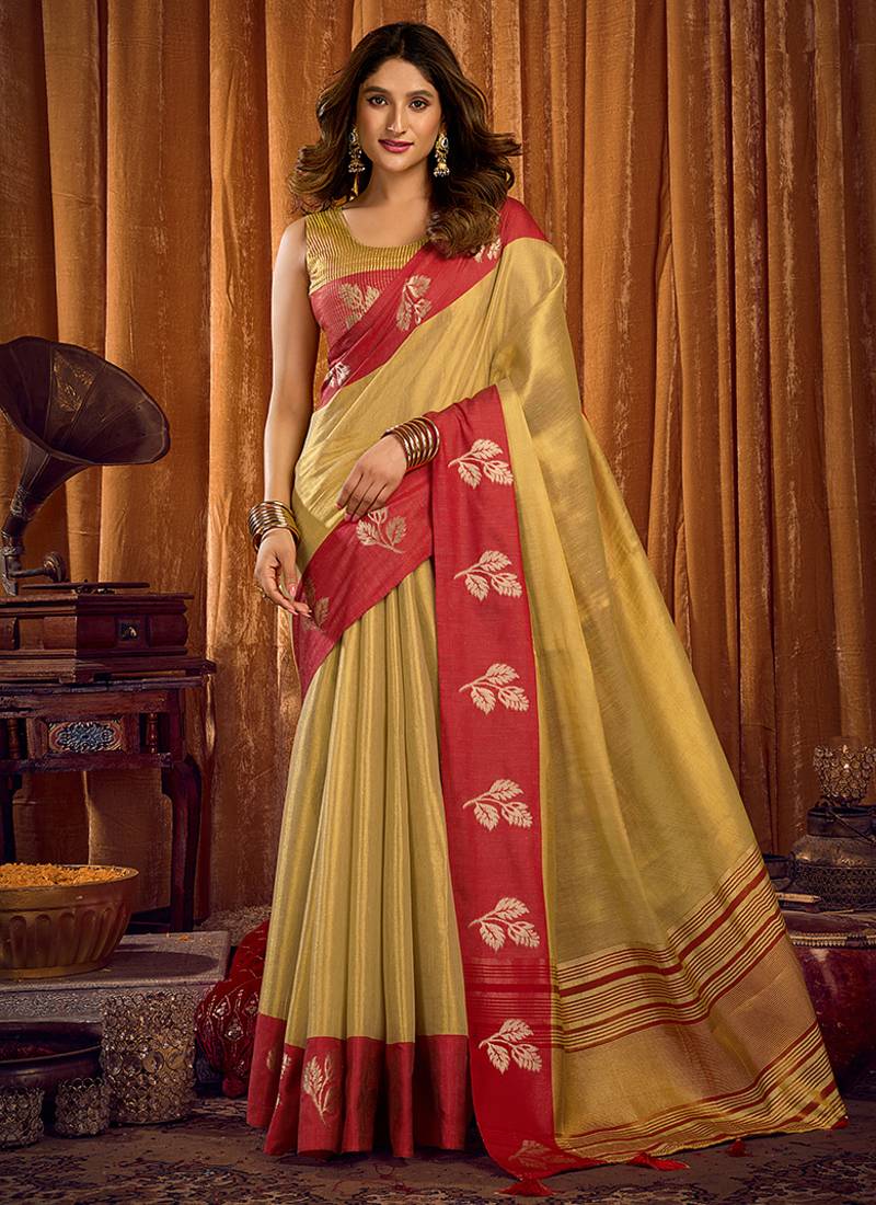 Golden beige soft tissue silk blend saree with red zari woven border