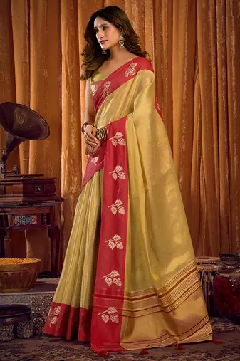 Golden beige soft tissue silk blend saree with red zari woven border