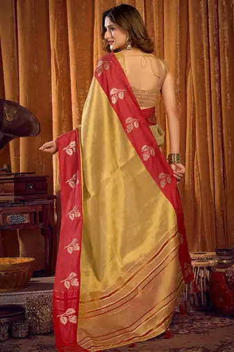 Golden beige soft tissue silk blend saree with red zari woven border