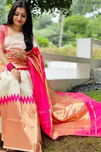 cream kanjeevaram saree with woven zari work