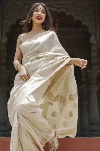 cream silk saree with woven design zari work
