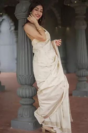 cream silk saree with woven design zari work