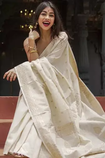 cream silk saree with woven design zari work