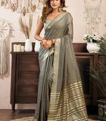 Grey khadi cotton saree with golden zari border and brocade blouse