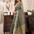 Grey khadi cotton saree with golden zari border and brocade blouse