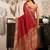 Red khadi cotton saree with golden zari border and brocade blouse