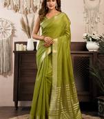 Green khadi cotton saree with golden zari border and brocade blouse