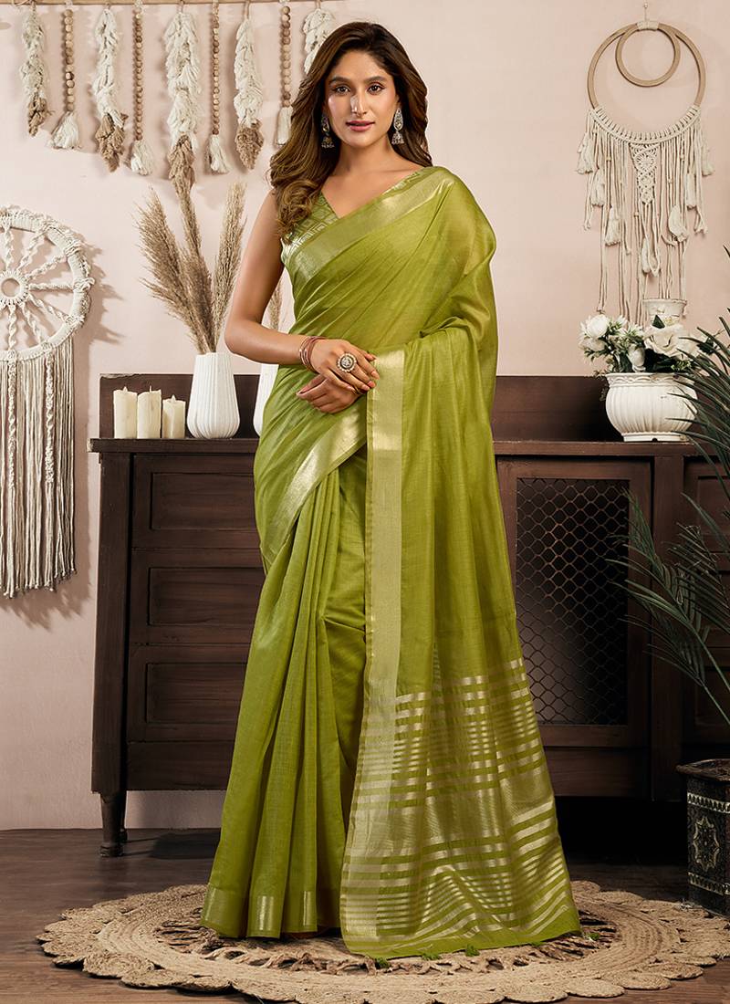Green khadi cotton saree with golden zari border and brocade blouse