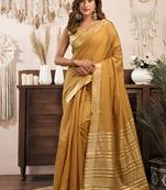 Mustard khadi cotton saree with golden zari border and brocade blouse