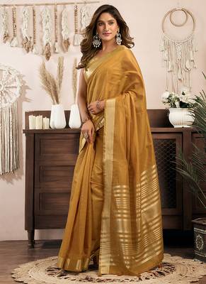 Mustard khadi cotton saree with golden zari border and brocade blouse 2