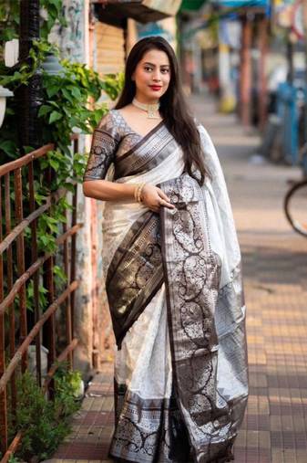 white silk blend saree with woven design zari work