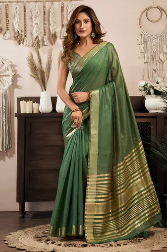 Green khadi cotton saree with golden zari border and brocade blouse