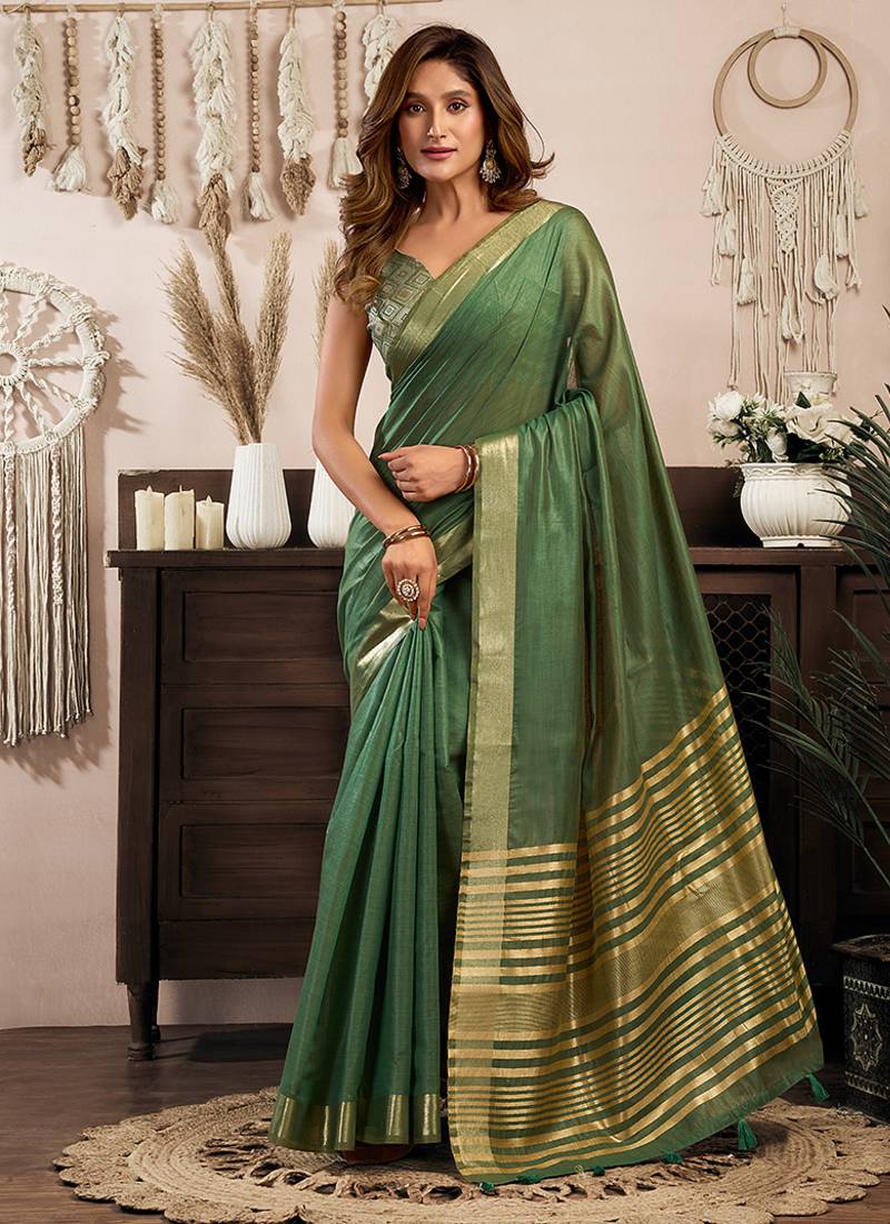 Green khadi cotton saree with golden zari border and brocade blouse