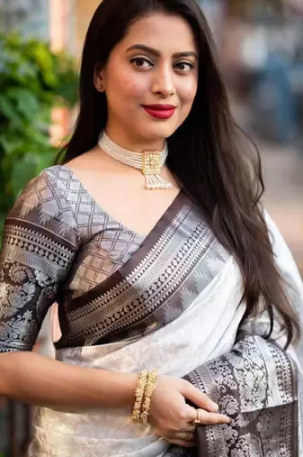 white silk blend saree with woven design zari work