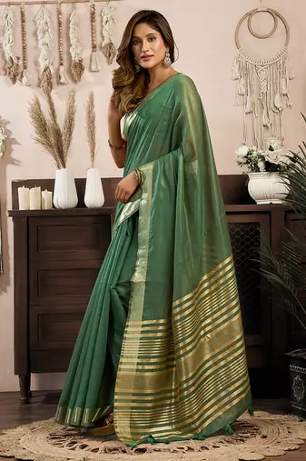 Green khadi cotton saree with golden zari border and brocade blouse