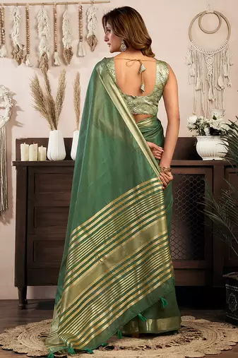 Green khadi cotton saree with golden zari border and brocade blouse