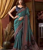 Teal faux crepe silk printed saree with blouse piece