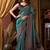 Teal faux crepe silk printed saree with blouse piece