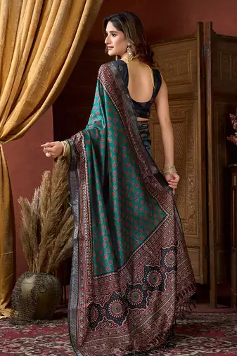 Teal faux crepe silk printed saree with blouse piece
