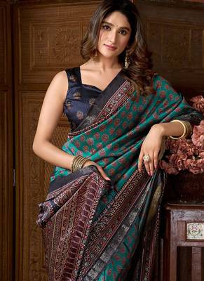 Teal faux crepe silk printed saree with blouse piece 4