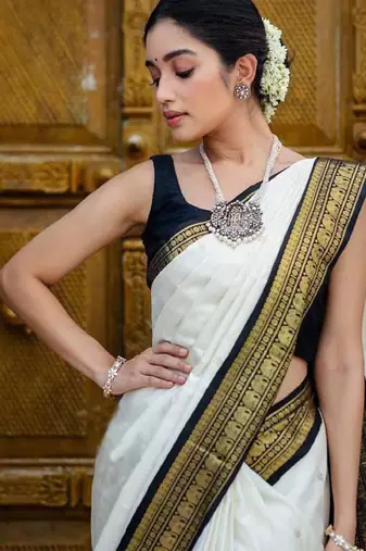 white art silk saree with woven zari design