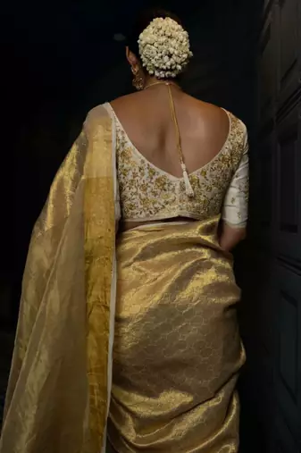 beige tissue saree with woven zari kanjeevaram design