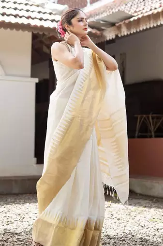 white banarasi saree with striped zari design