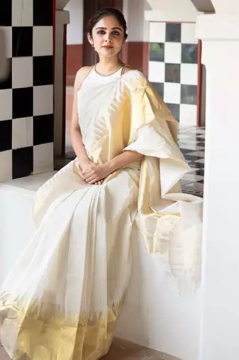 white banarasi saree with striped zari design