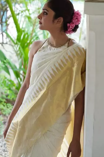 white banarasi saree with striped zari design