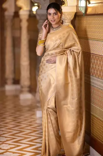 gold kanjeevaram saree with traditional woven design