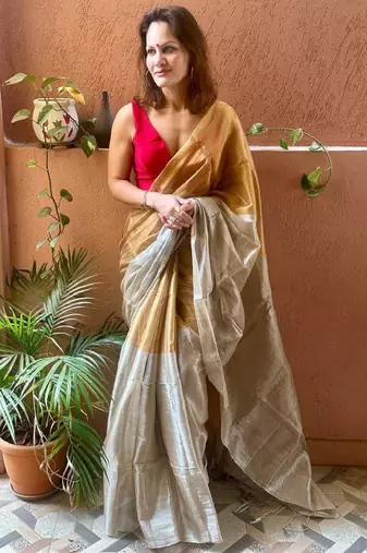 beige tissue solid saree with elegant minimal design