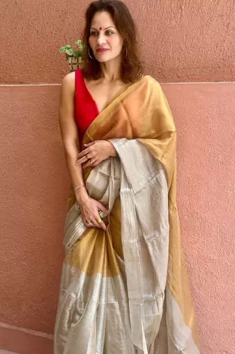beige tissue solid saree with elegant minimal design