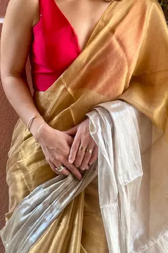 beige tissue solid saree with elegant minimal design