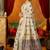 Cream cotton blend saree with traditional ethnic motifs and includes blouse piece