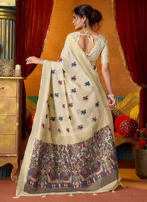 Cream cotton blend saree with traditional ethnic motifs and includes blouse piece 3