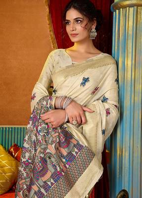 Cream cotton blend saree with traditional ethnic motifs and includes blouse piece 4
