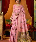 Pink cotton blend saree with traditional ethnic motifs and includes blouse piece
