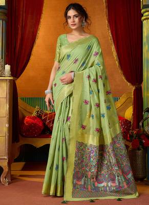 Light green cotton blend saree with traditional ethnic motifs and includes blouse piece 1