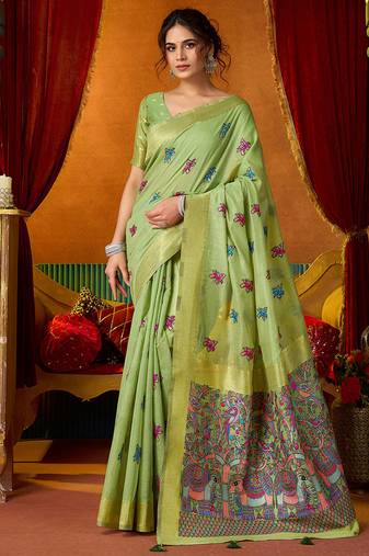 Light green cotton blend saree with traditional ethnic motifs and includes blouse piece