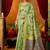 Light green cotton blend saree with traditional ethnic motifs and includes blouse piece
