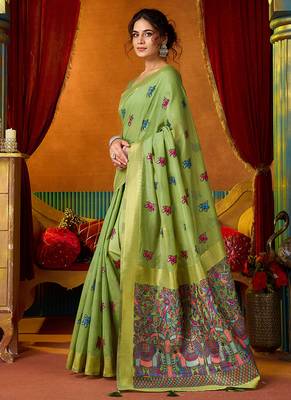 Light green cotton blend saree with traditional ethnic motifs and includes blouse piece 2