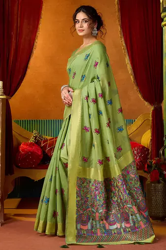 Light green cotton blend saree with traditional ethnic motifs and includes blouse piece