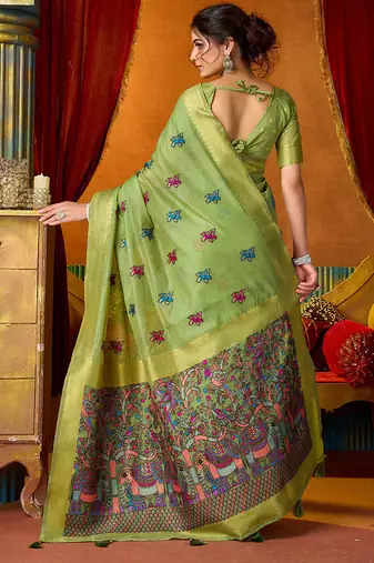 Light green cotton blend saree with traditional ethnic motifs and includes blouse piece