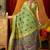 Light green cotton blend saree with traditional ethnic motifs and includes blouse piece