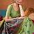 Light green cotton blend saree with traditional ethnic motifs and includes blouse piece