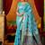 Sky blue cotton blend saree with traditional ethnic motifs and includes blouse piece
