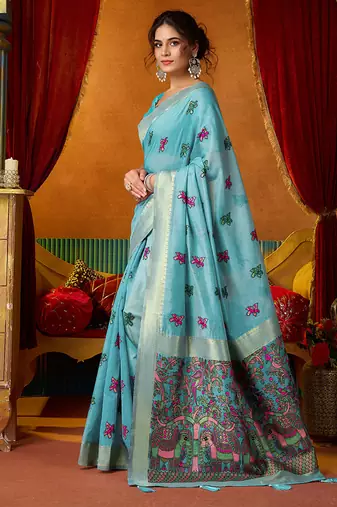 Sky blue cotton blend saree with traditional ethnic motifs and includes blouse piece