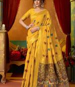 Mustard cotton blend saree with traditional ethnic motifs and includes blouse piece