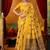 Mustard cotton blend saree with traditional ethnic motifs and includes blouse piece