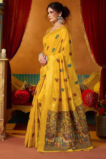 Mustard cotton blend saree with traditional ethnic motifs and includes blouse piece
